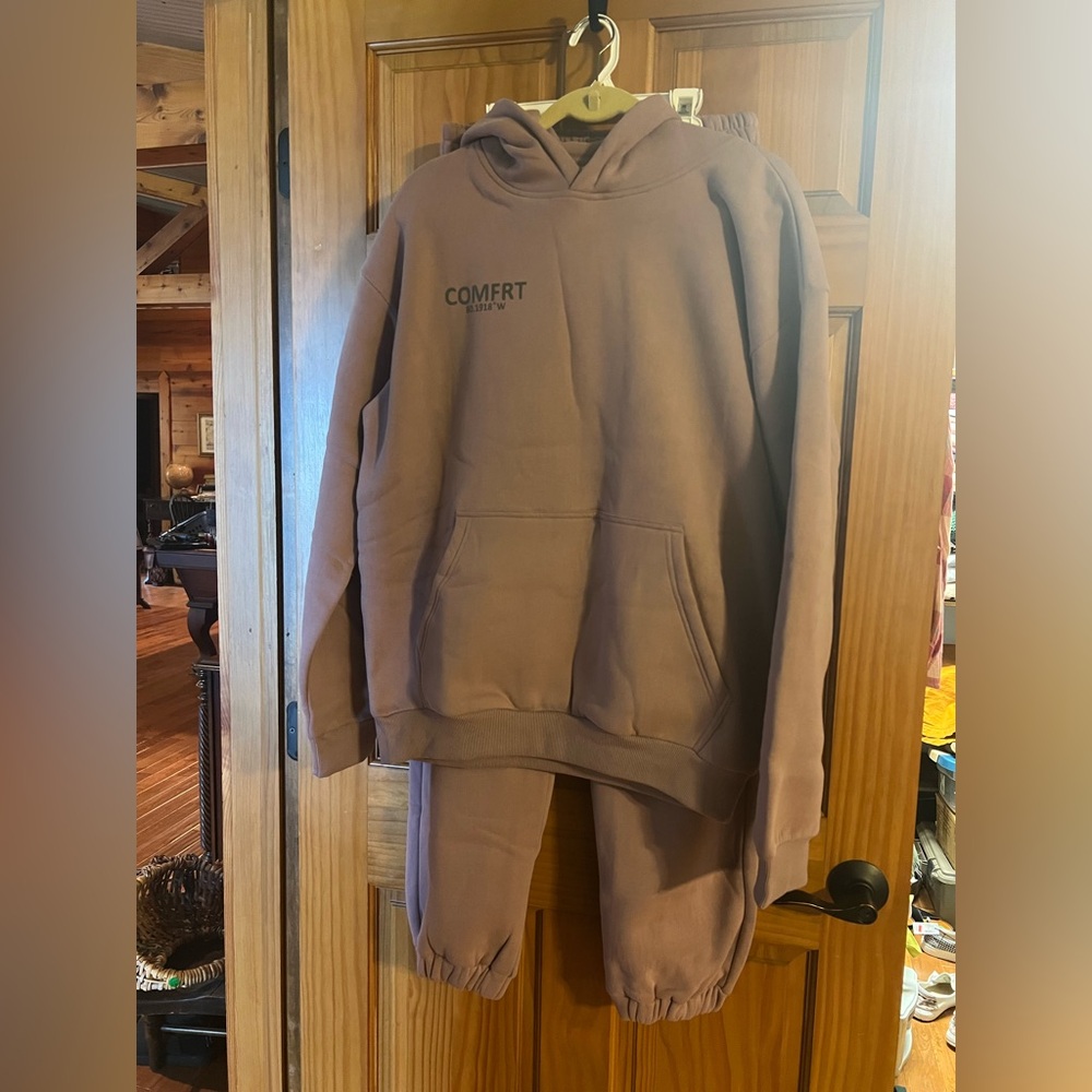 Comfrt sweatpants and hoodie. Brand new, orchid, color. Size medium.